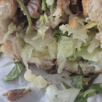 Tealicious - This is there version of a Pork Bahn Mi. Fill the roll with lettuce then add a little meat and toppings to make it look full. - Coffee & Tea Near Me - Adelanto, California