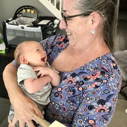 Doulas Plus - Linda cuddling our precious new born baby boy!
