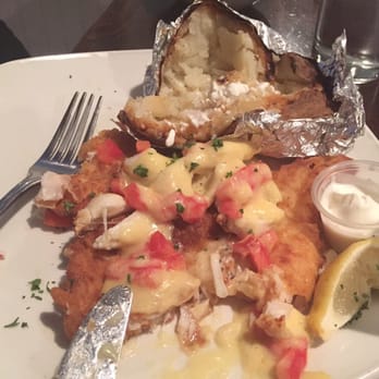Miller's Waterfront Restaurant - Grouper with crab meat and hollandaise sauce. - Seafood Near Me - Nags Head, North Carolina Miller's Waterfront Restaurant - Grouper with crab meat and hollandaise sauce. - Seafood Near Me - Nags Head, North Carolina