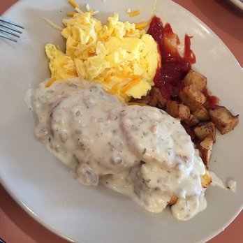 Sunset Grill - Biscuits and Sausage Gravy served with eggs - American Near Me - Fredericksburg, Texas