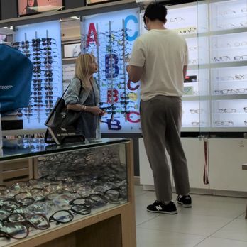 MK Vision Center - Howard assisting another customer. - Optometrists Near Me - Forest Hills, New York MK Vision Center - Howard assisting another customer. - Optometrists Near Me - Forest Hills, New York