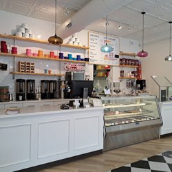 Cashier station with lots of desserts and coffee