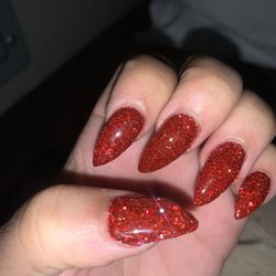 Nail Rouge - Crooked uneven, not smoothed nail.