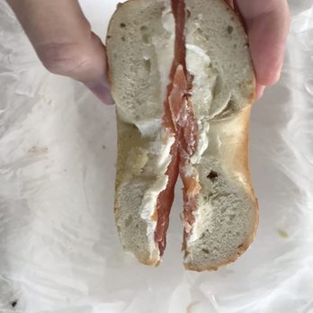 Bagel Cafe - Half of a $9 plain "bagel" with lox, untoasted. - Bagels Near Me - Delran, New Jersey