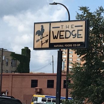 Wedge Community - a sign for the wedge natural foods group - Grocery Near Me - Minneapolis, Minnesota