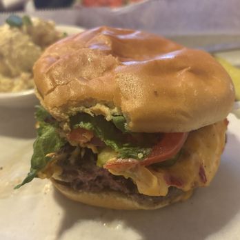 The Rookery - Johnny Jenkins burger with homemade pimento cheese and bread and butter pickles. Delicious! - Bars Near Me - Macon, Georgia The Rookery - Johnny Jenkins burger with homemade pimento cheese and bread and butter pickles. Delicious! - Bars Near Me - Macon, Georgia