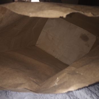 China Kitchen - a brown paper bag on a bed - Chinese Near Me - Ooltewah, Tennessee China Kitchen - a brown paper bag on a bed - Chinese Near Me - Ooltewah, Tennessee