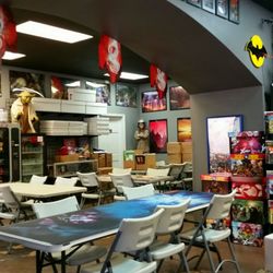 Twin Suns Comics and Games - One section of tables and such