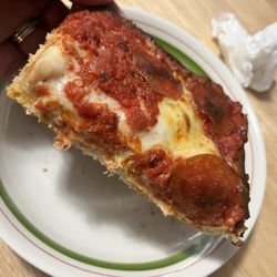Briannis Pizza - Slice of pepperoni wanted to show hidden pepperoni on side