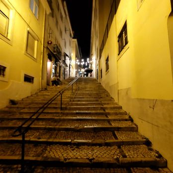 Solar do Duque - View of the restaurants with lights from the bottom of the stairs - Restaurants Near Me - Lisbon, 11 Solar do Duque - View of the restaurants with lights from the bottom of the stairs - Restaurants Near Me - Lisbon, 11