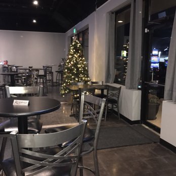 Midtown Bar & Grill - a christmas tree in the background - Wine Bars Near Me - Manhattan, Illinois Midtown Bar & Grill - a christmas tree in the background - Wine Bars Near Me - Manhattan, Illinois