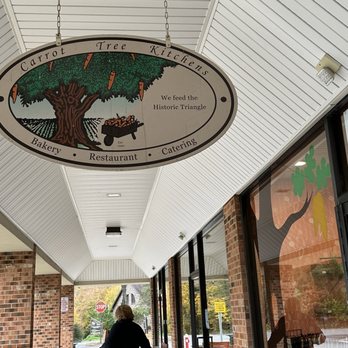 Carrot Tree Kitchens - a woman walking down the sidewalk - Breakfast & Brunch Near Me - Williamsburg, Virginia Carrot Tree Kitchens - a woman walking down the sidewalk - Breakfast & Brunch Near Me - Williamsburg, Virginia