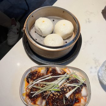 Antidote - Egg Lava Buns 3 Slice on top and Beef in chili oil on bottom - Cocktail Bars Near Me - Brooklyn, New York Antidote - Egg Lava Buns 3 Slice on top and Beef in chili oil on bottom - Cocktail Bars Near Me - Brooklyn, New York