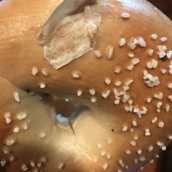 Manhattan Bagel - Stale bagel with piece of paper stuck to it - Bagels Near Me - Roseland, New Jersey