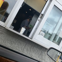 Worker using cell phone Worker using cell phone