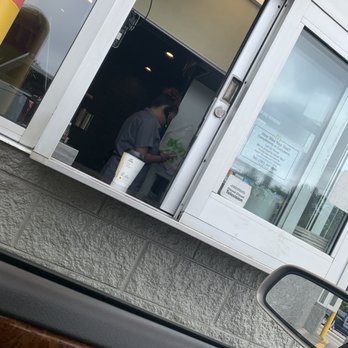 McDonald's - Worker using cell phone - Coffee & Tea Near Me - Pawtucket, Rhode Island McDonald's - Worker using cell phone - Coffee & Tea Near Me - Pawtucket, Rhode Island