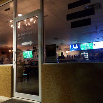 10 Twenty Five - View inside from the outdoor smoking/seating area. Great setup for watching a game/match/set/race/fight/tourney. - New American Near Me - Cape Coral, Florida 10 Twenty Five - View inside from the outdoor smoking/seating area. Great setup for watching a game/match/set/race/fight/tourney. - New American Near Me - Cape Coral, Florida