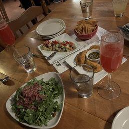 Ceviche and chips, salad, vegetarian empanadas.