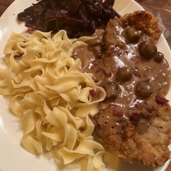 Village Lanterne - JÄGERSCHNITZEL covered in mushroom gravy. Served with French fries & seasonal vegetables. $27.50 - German Near Me - Lindenhurst, New York Village Lanterne - JÄGERSCHNITZEL covered in mushroom gravy. Served with French fries & seasonal vegetables. $27.50 - German Near Me - Lindenhurst, New York