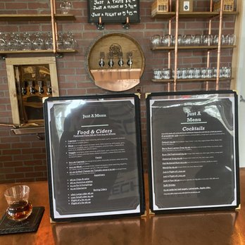 Just Rum - two menus on a wooden table - Distilleries Near Me - Sandy, Oregon