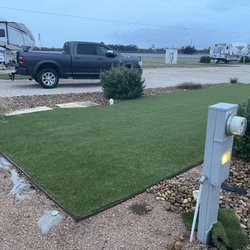 Arch Ray RV Park - Astroturf unusable to far from hook ups.