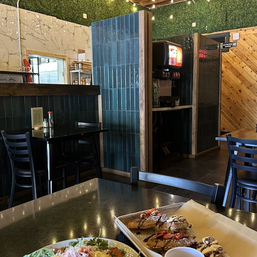 Cafe Stella - Indoor atmosphere, berry banana waffle, Flagstaff hashbrown waffle - Italian Near Me - Flagstaff, Arizona