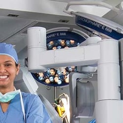 G. Kevin Gillian, MD - Dr. Gillian & Divya  Bansal PA-C in the operating room with the Da Vinci Robot. Dr. G was the first Gen Surgeon the Mid Atlantic to use it.