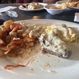 Home Fries scrambled eggs spicy sausage and sausage gravy too much to finish!