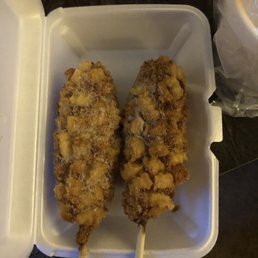 Two potato half and half corn dogs to go
