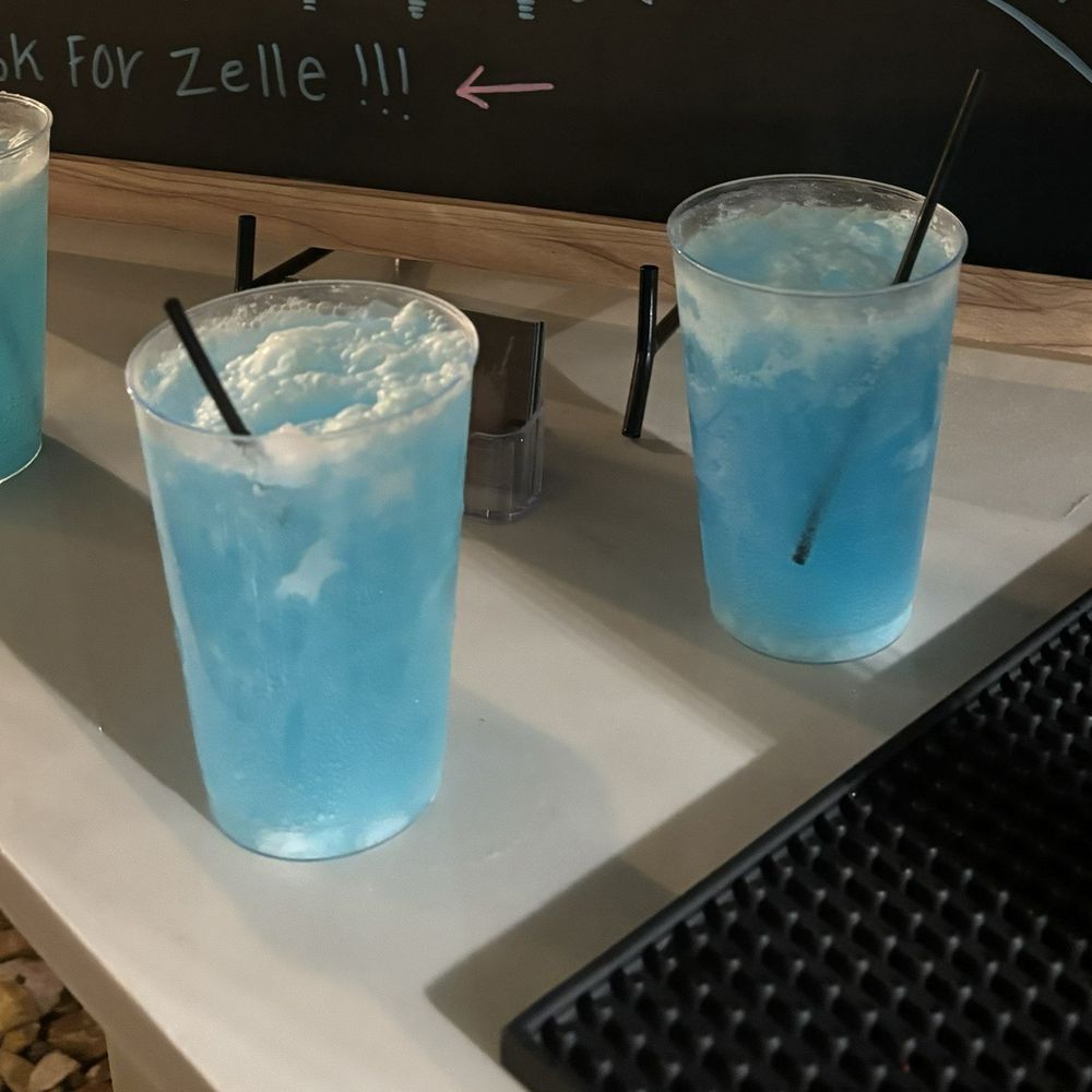Happy Hour Hide Out - This is a coconut mocktail called Jack Frost !! - Bartenders Near Me Happy Hour Hide Out - This is a coconut mocktail called Jack Frost !! - Bartenders Near Me