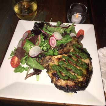 Salud Bar & Grill - Pork chop with Indian spices, so juicy and flavorful, comes with basmati rice and salad but ordered just with salad, delicious! - Latin American Near Me - Brooklyn, New York Salud Bar & Grill - Pork chop with Indian spices, so juicy and flavorful, comes with basmati rice and salad but ordered just with salad, delicious! - Latin American Near Me - Brooklyn, New York