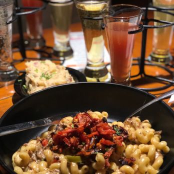 Adirondack Pub & Brewery - Pulled pork mac and cheese and in the background a side of the pub garlic mashed potato - Breweries Near Me - Lake George, New York Adirondack Pub & Brewery - Pulled pork mac and cheese and in the background a side of the pub garlic mashed potato - Breweries Near Me - Lake George, New York