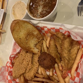 Louisiana Fish House - Catfish and shrimp basket with fries and toast- additional side of red beans and rice and hush puppies. - Cajun/Creole Near Me - Houston, Texas Louisiana Fish House - Catfish and shrimp basket with fries and toast- additional side of red beans and rice and hush puppies. - Cajun/Creole Near Me - Houston, Texas
