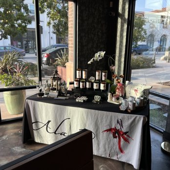 Alara Cellars - a table with bottles of wine - Wine Tasting Room Near Me - Morgan Hill, California