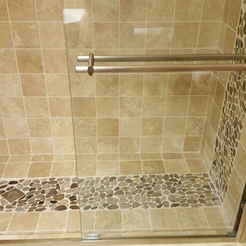 Del-Ray Construction - Italian Travertine with river rock in lay. - General Contractors Near Me Del-Ray Construction - Italian Travertine with river rock in lay. - General Contractors Near Me