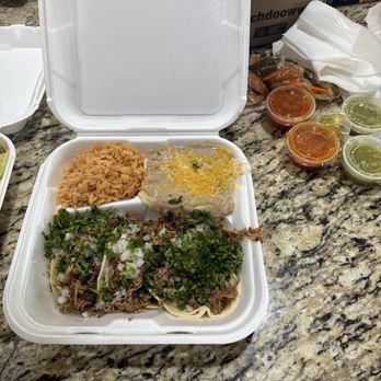 Nevada Taco Grill - These are three shredded Beef St. tacos with rice and beans. The tacos are really good. They also have a really good - Tacos Near Me - Sparks, Nevada