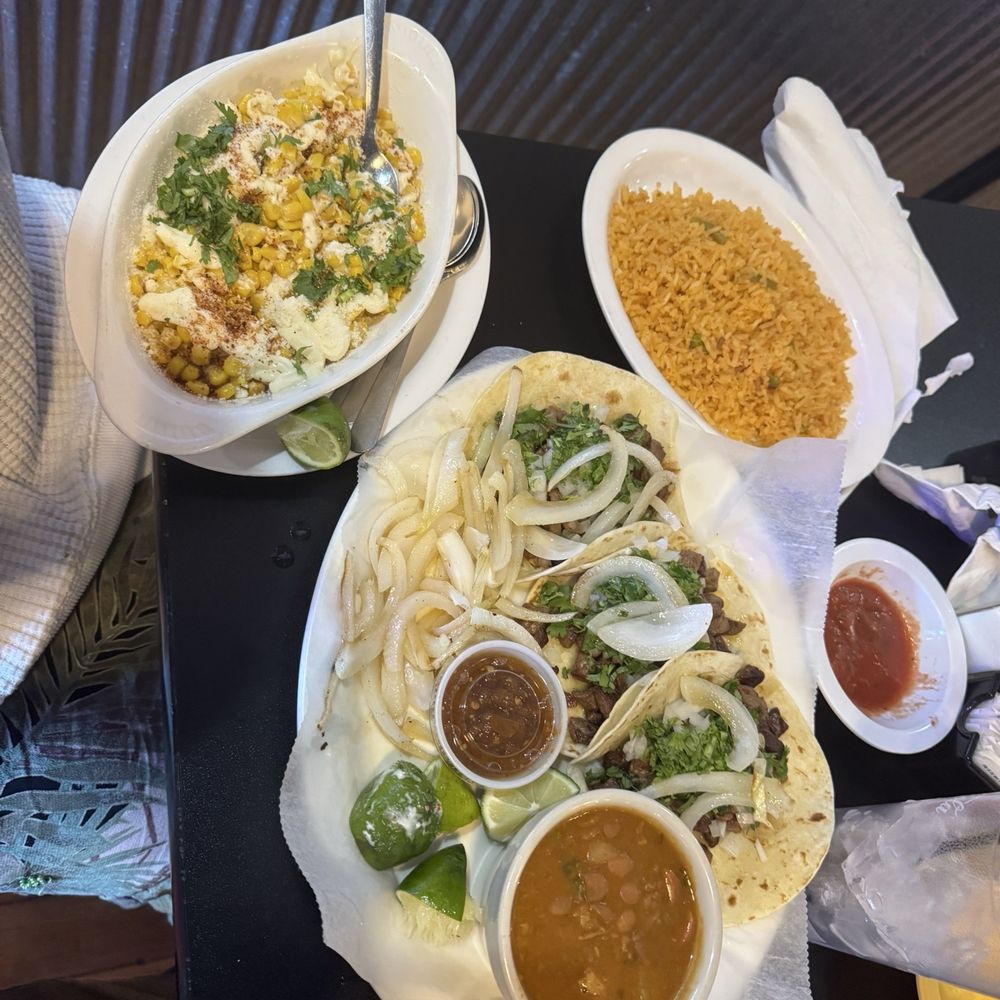 Fuego Mexican restaurant - Pick your three tacos. 10/10. Street corn, 15/10, absolutely amazing!! And a side of rice which was also great. - Mexican Near Me - Adair, Iowa