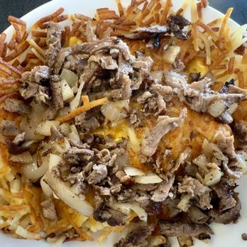 Waffle House - Cheesesteak melted hash browns. - Breakfast & Brunch Near Me - Melbourne, Florida