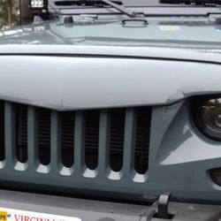 Terry's Body Shop - Jeep JK grill painted to match factory color.  Awesome!