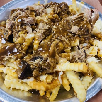 Honey's BBQ - Pulled Pork Poutine with Gravy - Barbeque Near Me - Davenport, Florida Honey's BBQ - Pulled Pork Poutine with Gravy - Barbeque Near Me - Davenport, Florida