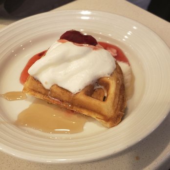 Seeds - a plate of waffles with whipped cream and syrup - American Near Me - Hanover, New Jersey Seeds - a plate of waffles with whipped cream and syrup - American Near Me - Hanover, New Jersey