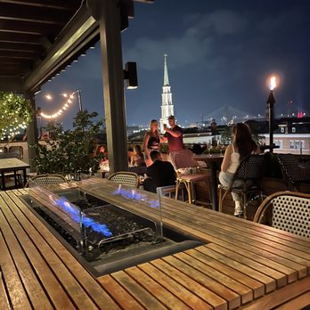 Peregrin - a view of a city at night - Bars Near Me - Savannah, Georgia