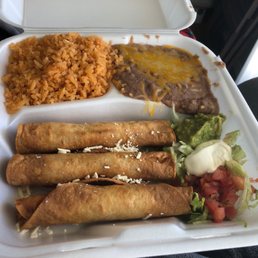 Chicken flautas with beans and rice. Real guacamole, cream and pick. Take out Chicken flautas with beans and rice. Real guacamole, cream and pick. Take out