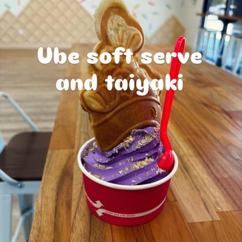 Kem Kem - Ube soft serve with a ube filled taiyaki, sprinkled with coconut flakes. - Desserts Near Me - Sacramento, California Kem Kem - Ube soft serve with a ube filled taiyaki, sprinkled with coconut flakes. - Desserts Near Me - Sacramento, California