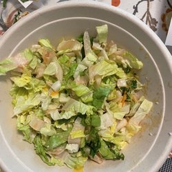 Tropical Smoothie Cafe - What is left of a salad we tried to eat with our own dressing.  You can see how organs the lettuce ends are.