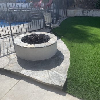 Crux Landscape, Inc. - Stone work to match pool/jacuzzi and turf - Landscaping Near Me