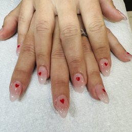 Acrylic nails, almond shaped.  Cute natural look for valentines.