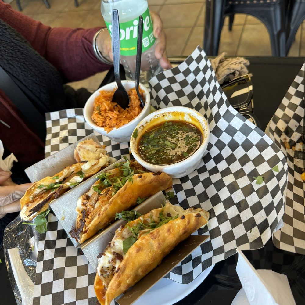 Fuego Taco - a plate of tacos and a bowl of salsa - Tacos Near Me - Midwest City, Oklahoma