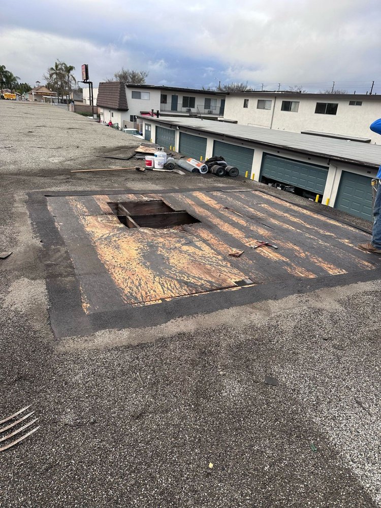 Slide of Tecun’s Roofing