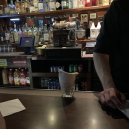 a bartender at the bar a bartender at the bar